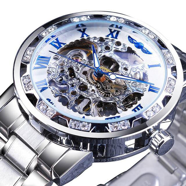 silver with blue hands skeleton luxury watch