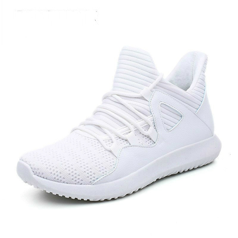 all white athletic running shoes