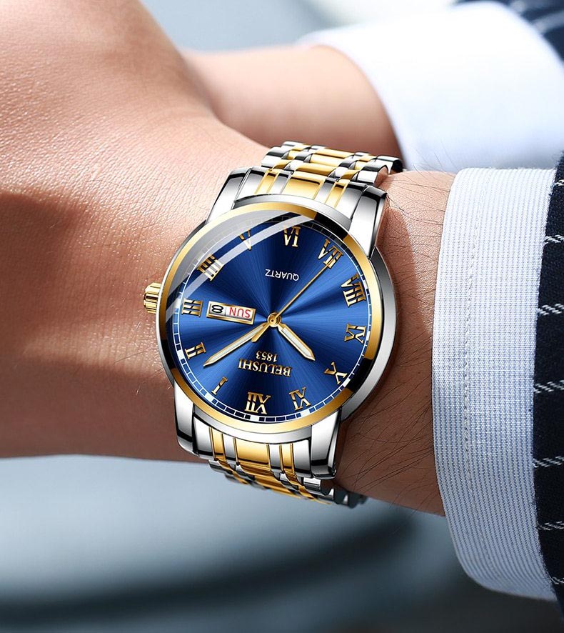 Blue gold face stainless steel watch on wrist