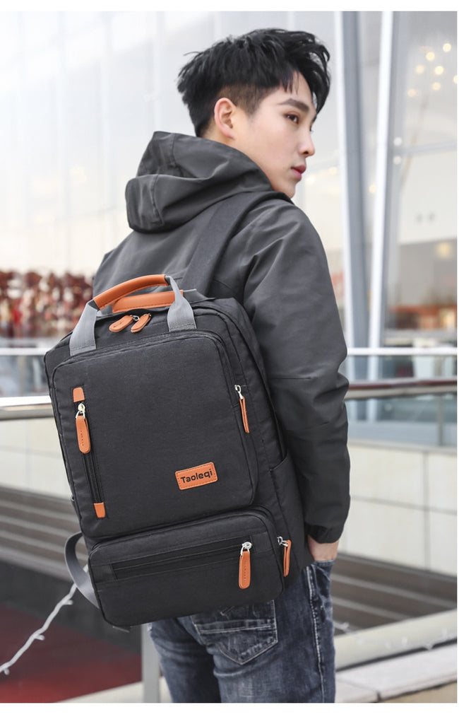 black canvas camel leather accents laptop backpack