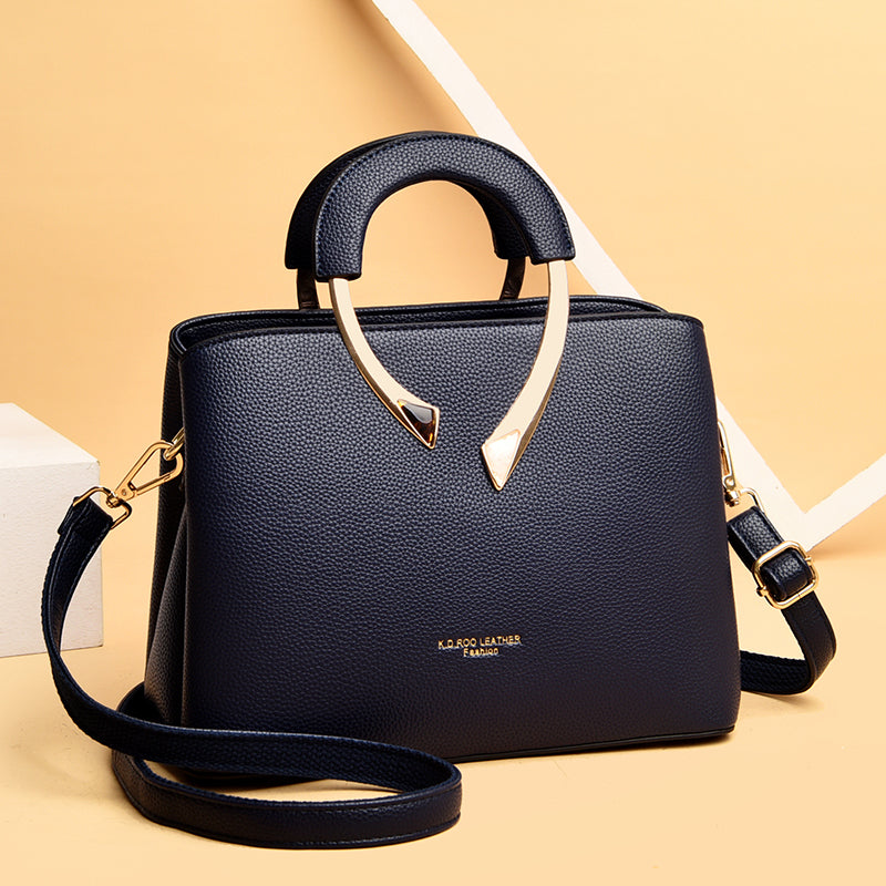dark blue leather handbag