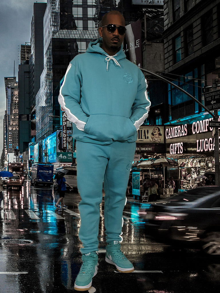 teal and white tracksuit