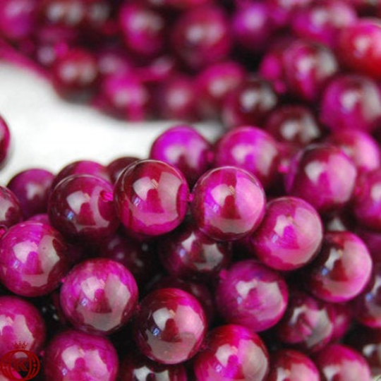 pink tiger eye gemstone bead strands