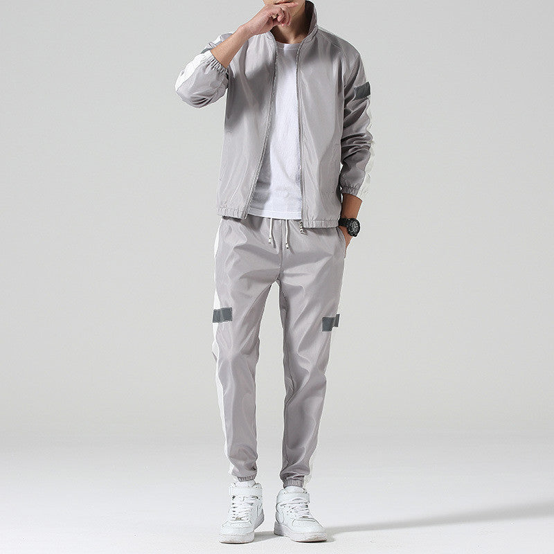 gray reflective track suit white stripe