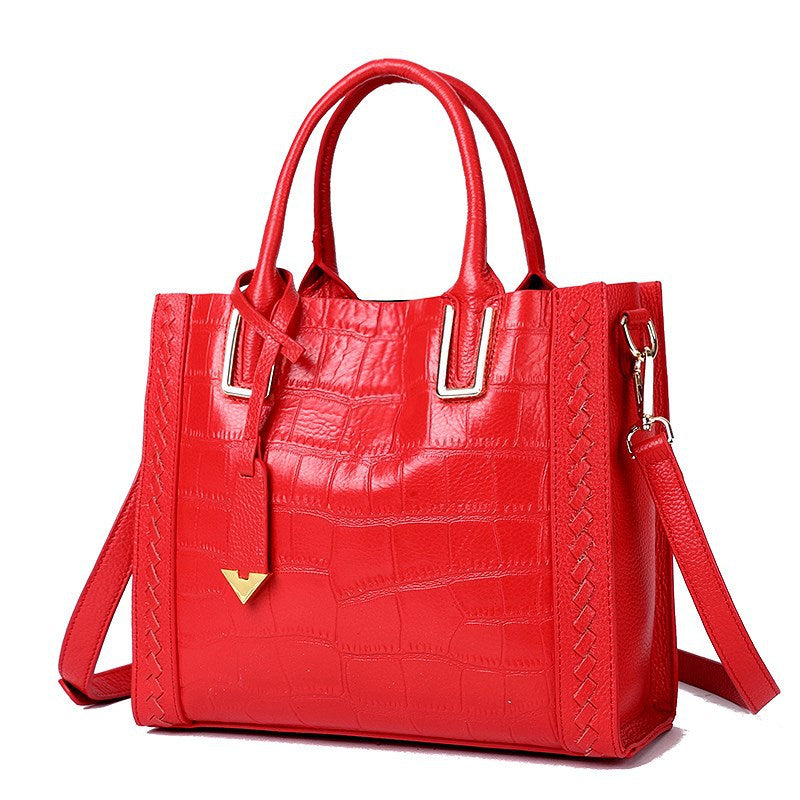 bright red leather crocodile pattern handbag