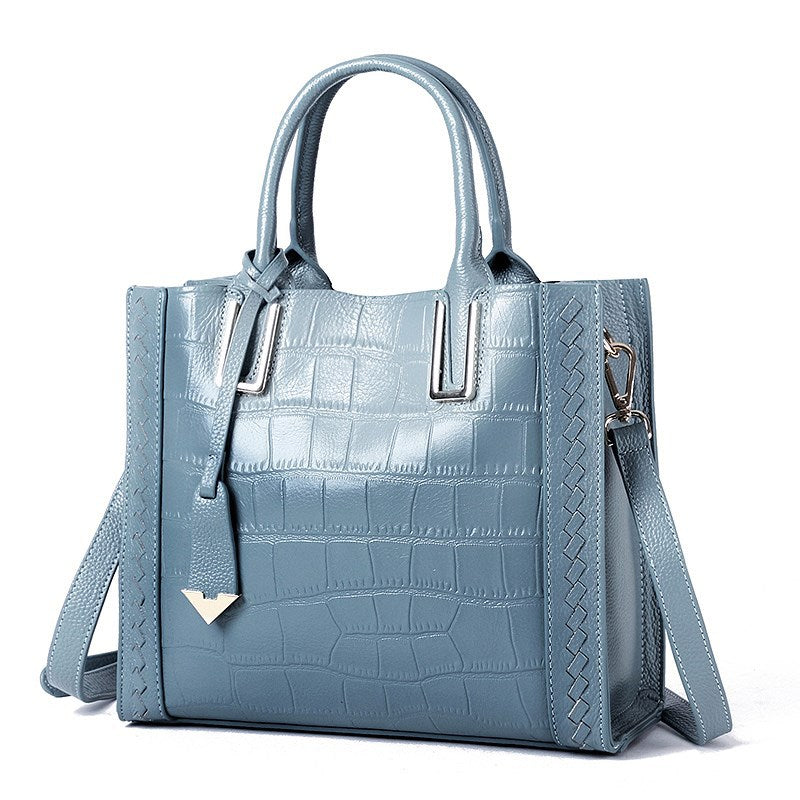 pale blue leather crocodile pattern handbag