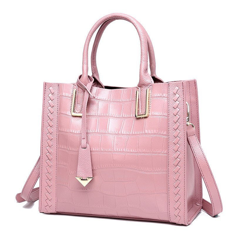 pink leather crocodile pattern handbag