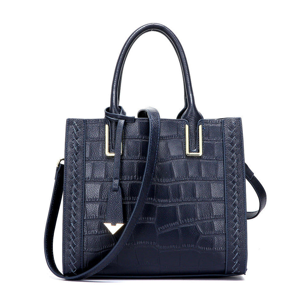 dark blue leather crocodile pattern handbag