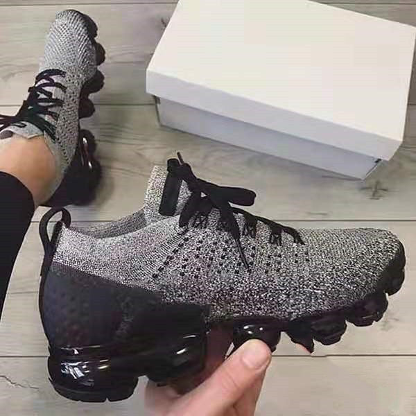 gray and black mesh air sole sneakers for women
