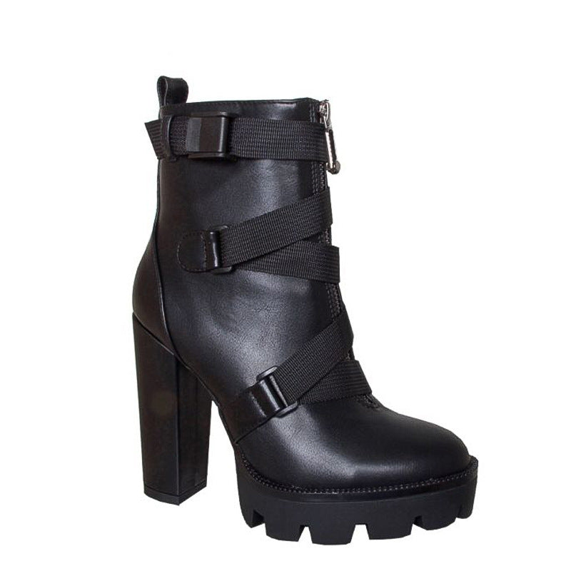 rugged black criss-cross strap boots