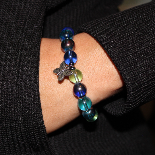 butterfly charm bead bracelet on wrist