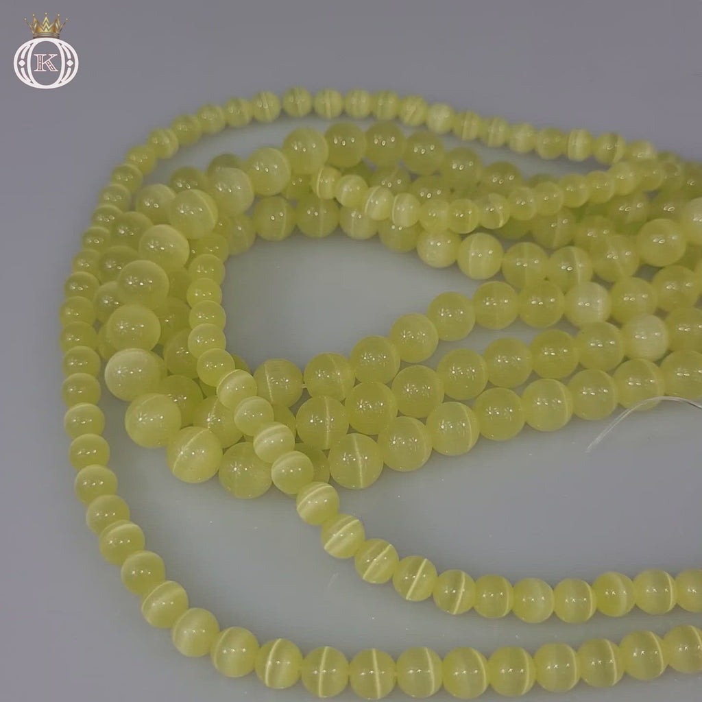 lemon yellow cats eye gemstone beads video