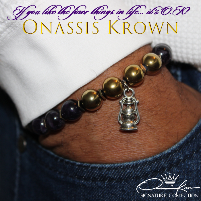 omega psi phi lamp charm bead bracelet on wrist