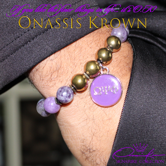 omega psi phi bead bracelet on wrist