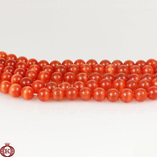 orange cats eye gemstone bead strands