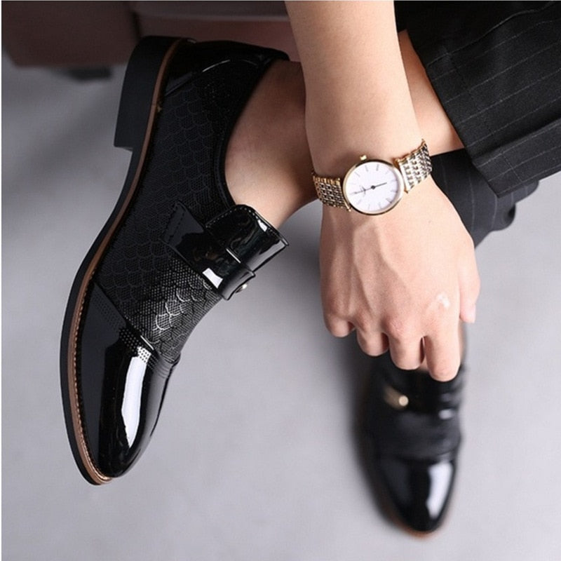 black patent leather fishscale pattern dress shoes and watch