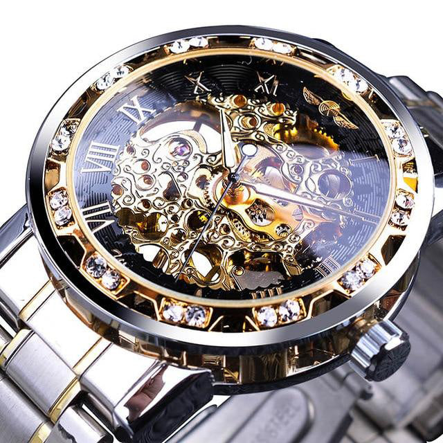 gold silver skeleton face watch