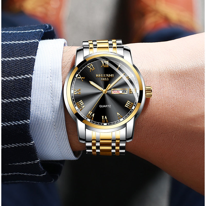black and gold face luxury watch on wrist