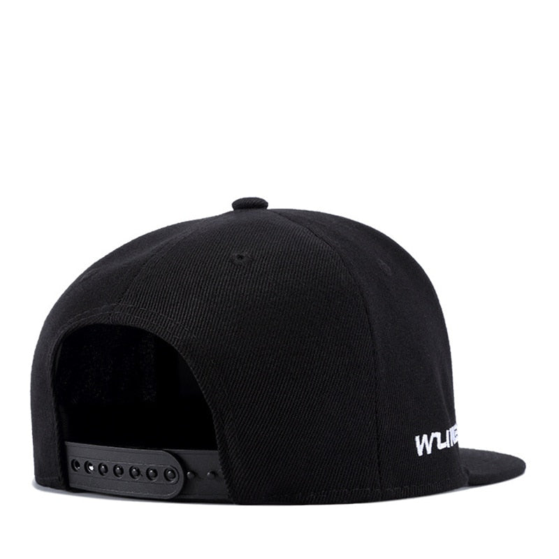 black embroidered snapback cap