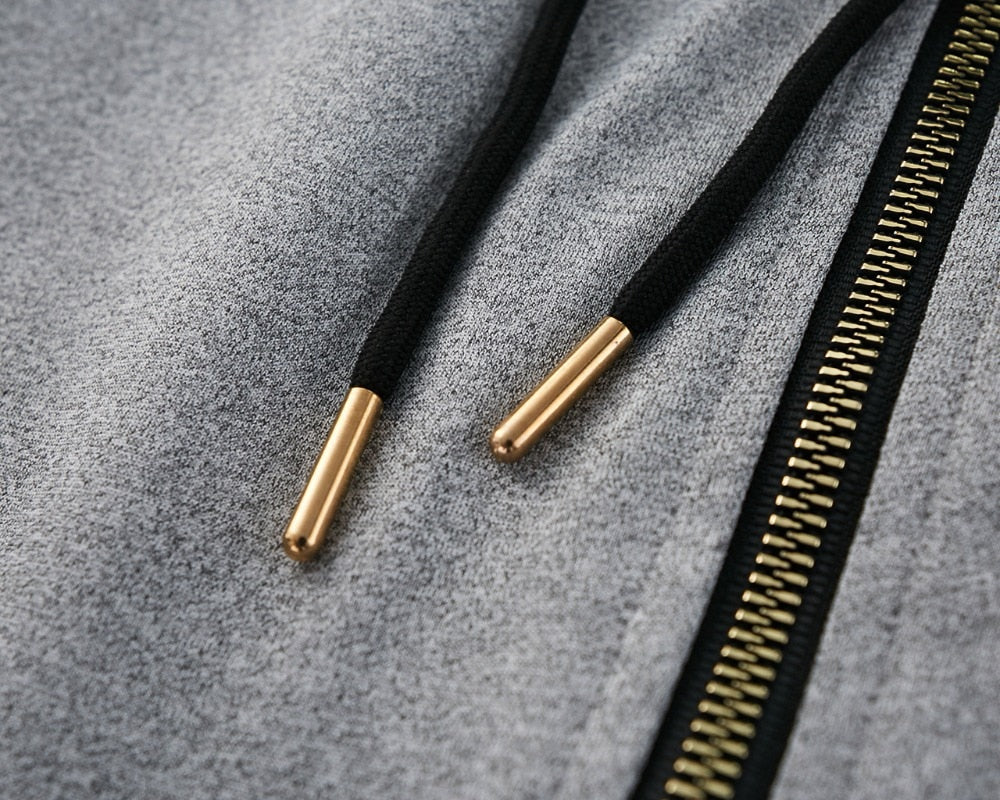 black and gold tip pull string hoodie sweat suit