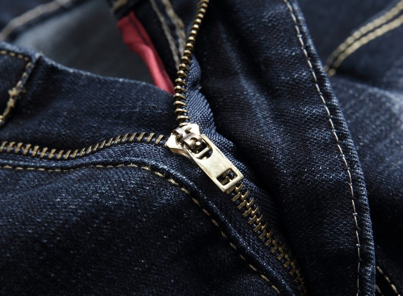 gold zipper blue jeans