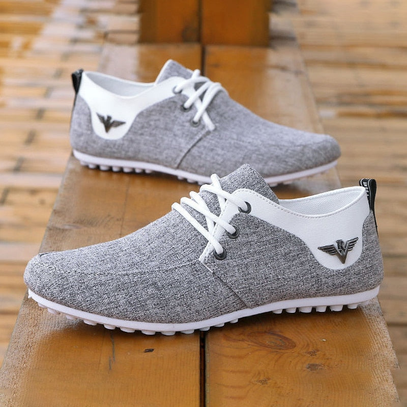 light gray white comfortable low canvas casual shoes