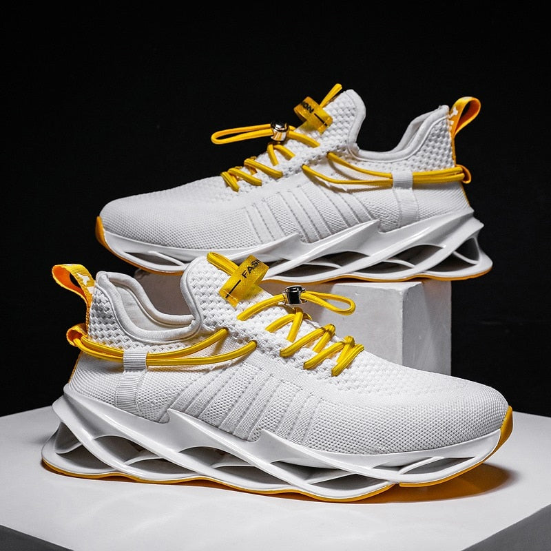white and yellow gold bottom sneakers