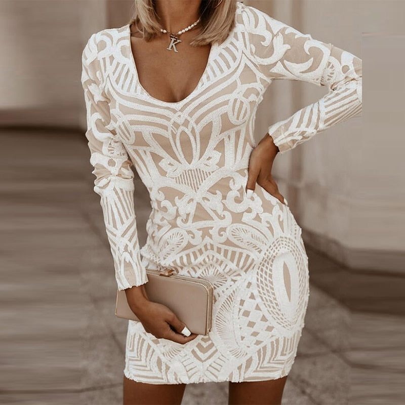 white low cut long sleeve patterned dress