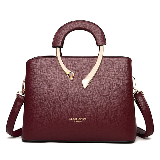 dark red leather handbag
