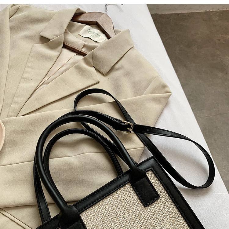 black trim natural beige small luxury handbag