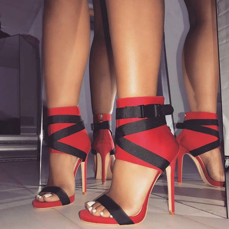 red high heel sandals with black straps