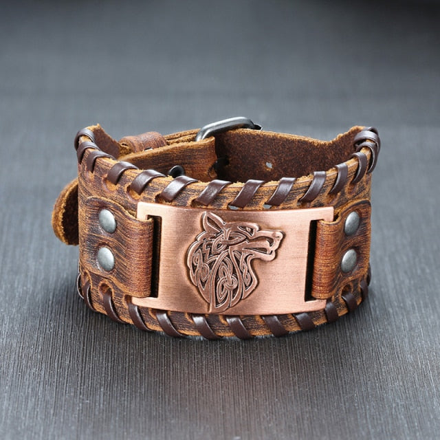 viking wolf engraved metal plate on brown leather bracelet