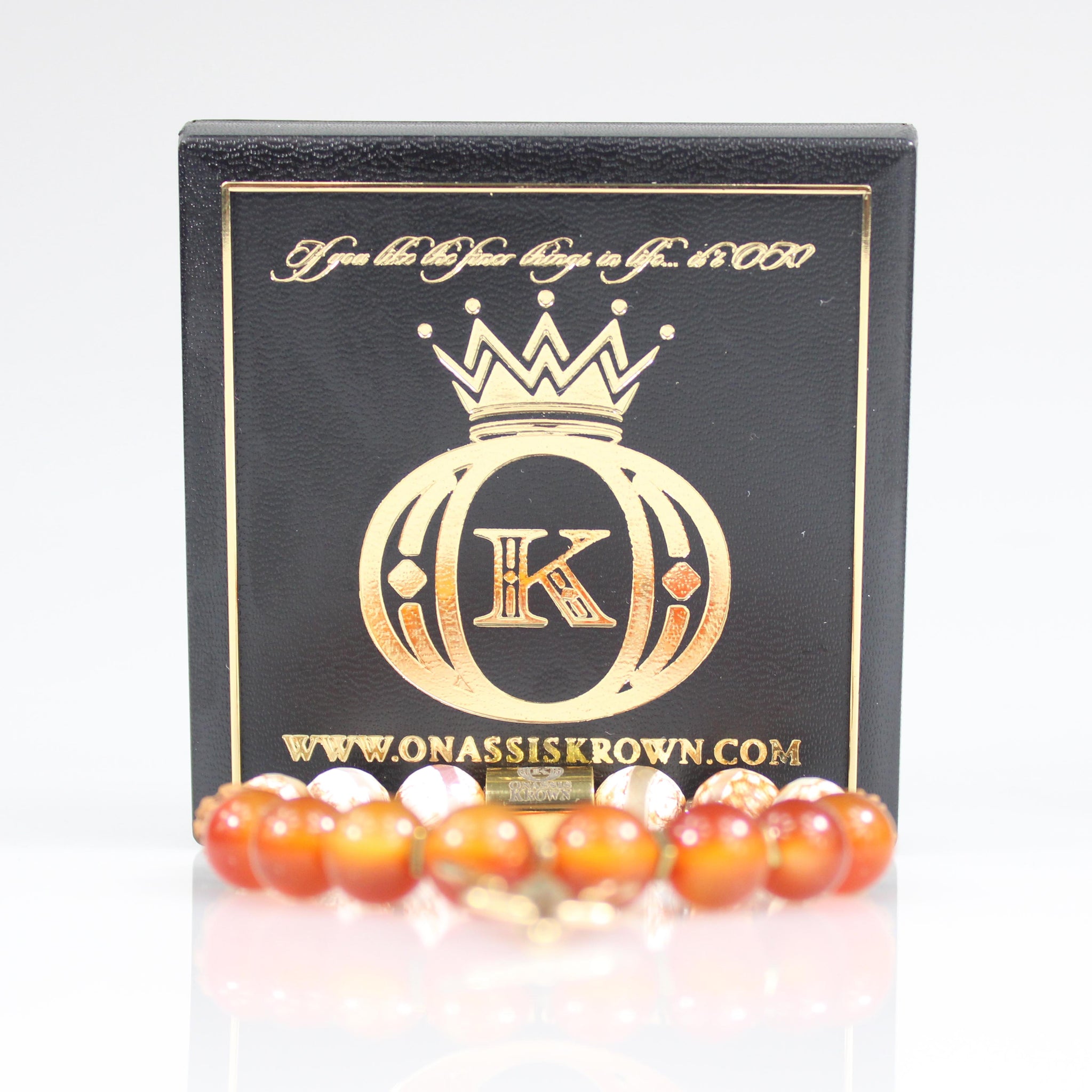 gold trident trishula charm orange carnelian tigerskin rudraksha bead bracelet